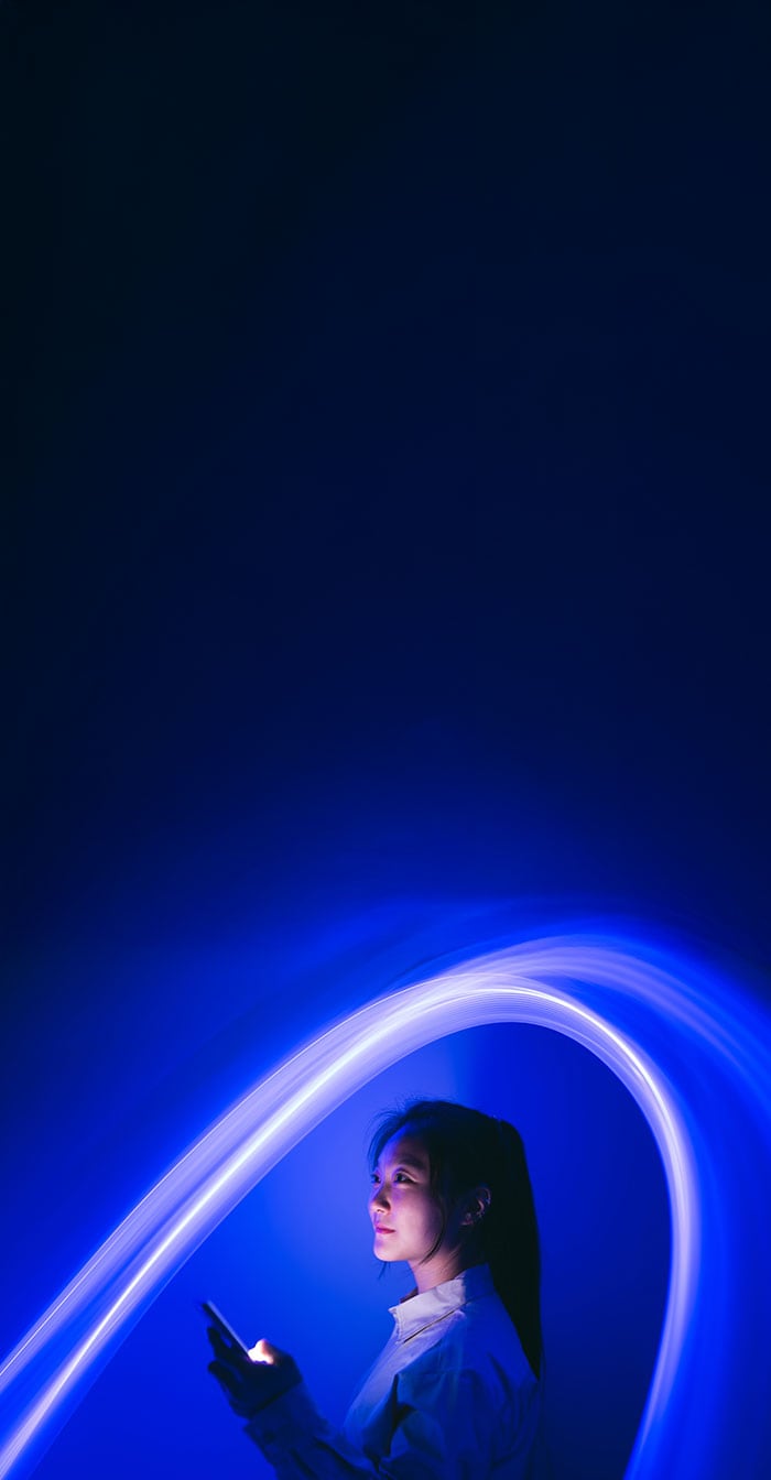 A woman surrounded by a blue aura wondering about her online privacy.
