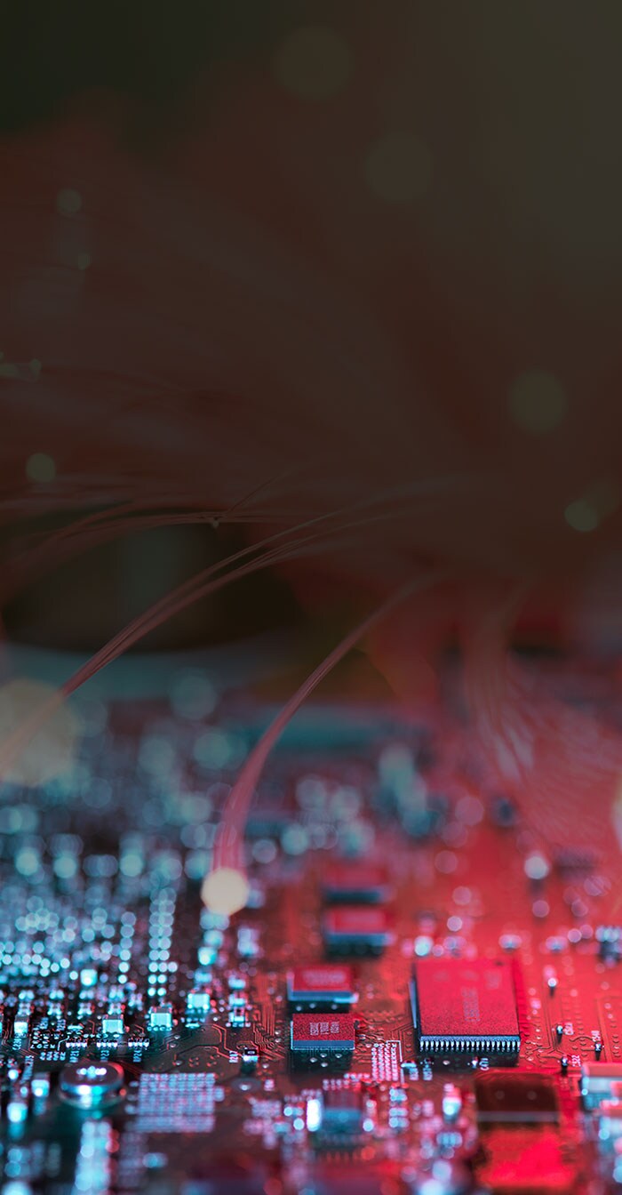 A glowing motherboard representing computer performance.